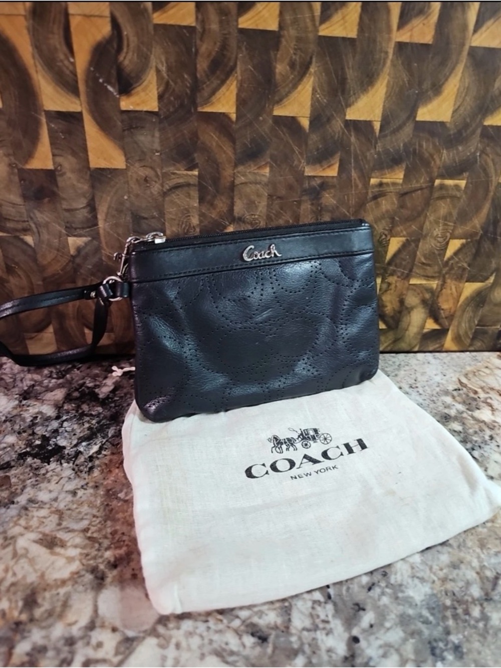 Coach Black Perforated Leather Wristlet with Silver Logo